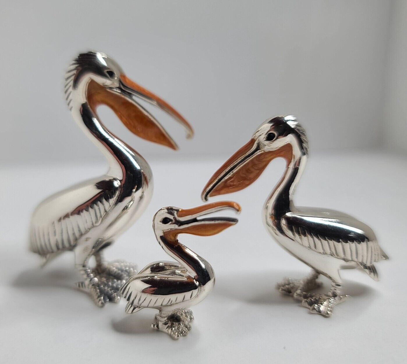Saturno Beak Pelican Family Trio Enamel & Silver Figurine Collection